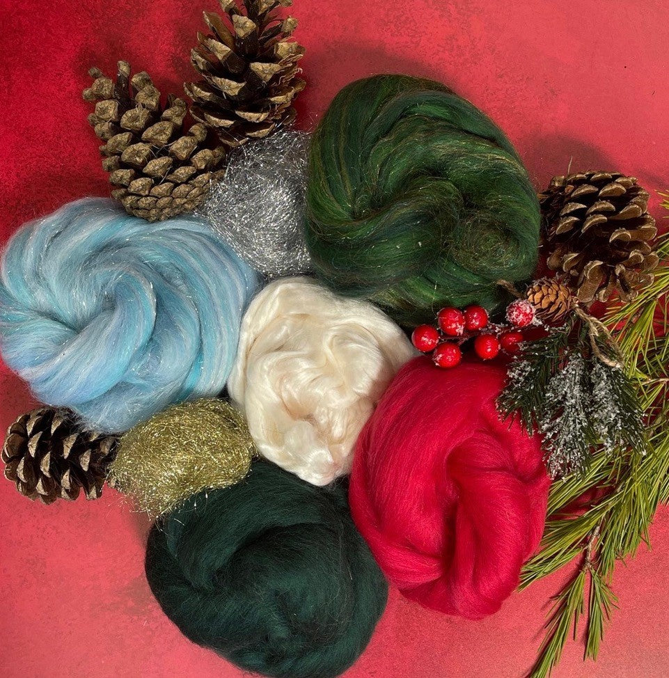 Festive Wool Pack from Crafty Kit Company.  Five 20g balls and two 2g balls in festive colours. 