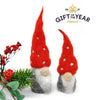 Two needle felt Nordic gnomes with holly sprig and Gift of the Year Awards 2021 Finalist banner